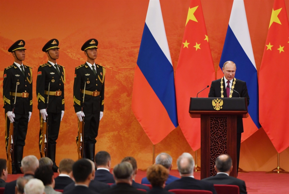 بوتين في الصين: للحفاظ على وحدة سوريا