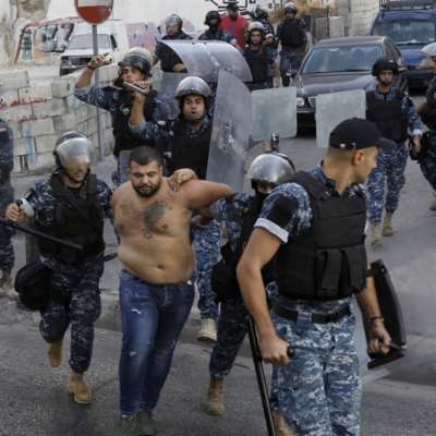 احتجاجات طرابلس: إحراق صورة رفيق الحريري!
