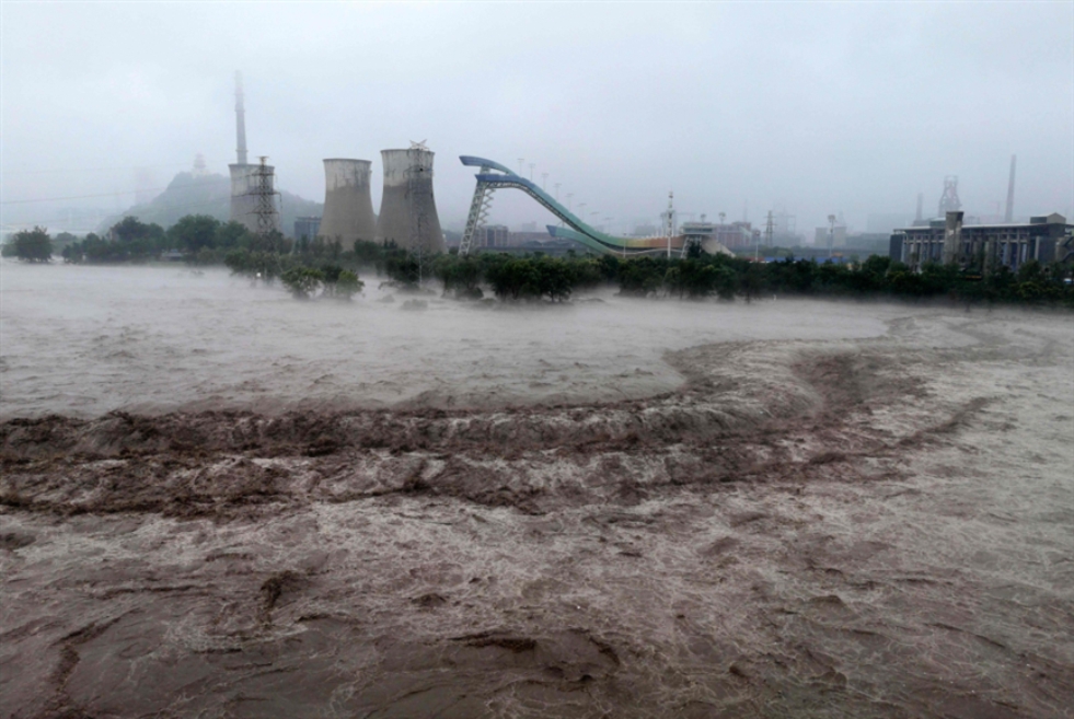 الصين: قتلى ومفقودون في الفيضانات... وتحذيرات من إعصار جديد قادم