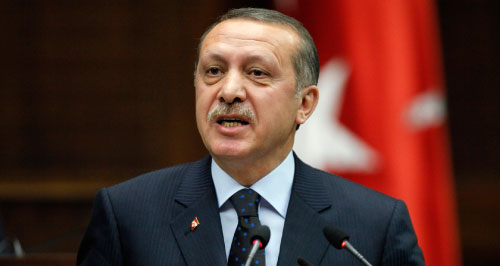 أردوغان مخاطباً نواب كتلة حزب العدالة والتنمية في البرلمان التركي أمس (أوميت بكتاس ــ رويترز)