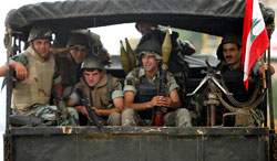 دورية للجيش قرب مخيم نهر البارد امس (رمزي حيدر- أ ف ب)