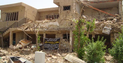 حطام منزل جبرا في حي المنصور البغدادي
