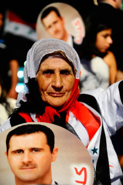 خلال الاحتفال بعيد ميلاد الرئيس السوري اول من امس في دمشق (رويترز)
