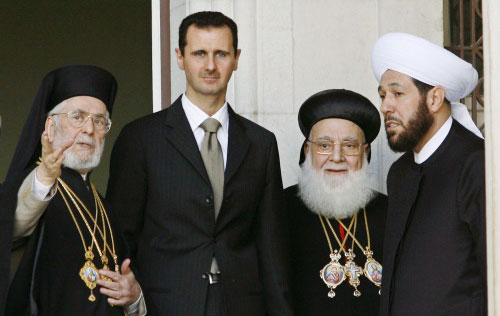 الأسد خلال زيارته الأبرشيّة الارثوذكسية في دمشق أوّل من أمس (رويترز)