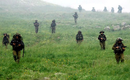 جنود إسرائيليون خلال تدريبات عسكرية في الجزء المحتل من مرتفعات الجولان في سوريا(أرشيف)