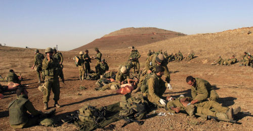 جنود إسرائيليّون خلال مناورات في الجولان المحتلّ الشهر الماضي (تسافرير أبايوف ــ أ ب)