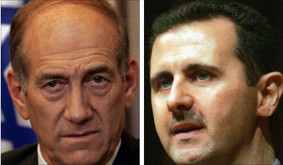 الأسد وأولمرت (أ ف ب)