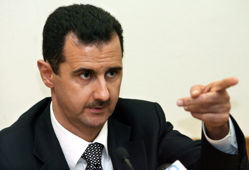 الأسد في مؤتمر صحافي في موسكو العام الماضي (يوري كادوبنوف  - ا ف ب)