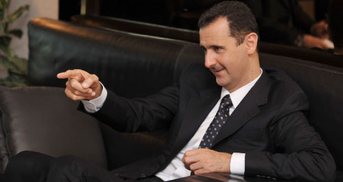 الأسد خلال مقابلته (روي سماحة  ـــ أ ف ب)