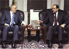 رئيس الوزراء العراقي نوري المالكي ووزير الداخلية جواد بولاني في بغداد