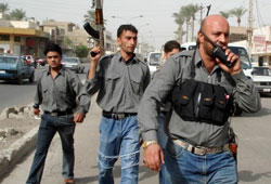 مسلّحون من مجلس صحوة الأدهميّة في العاصمة بغداد أمس (رويترز)