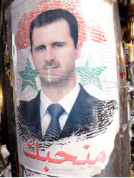 صورة للأسد في أحد شوارع دمشق (أ ب)
