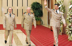 الرئيس السوري خلال مشاركته في احتفالات عيد الجيش في دمشق قبل ثلاثة أيام ( رويترز)