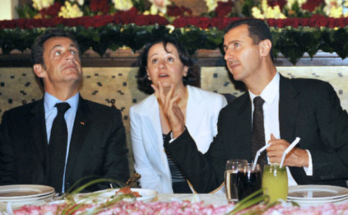 الأسد وساركوزي على مأدبة العشاء (جيرار كرلس ـــ أ ف ب)