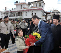 الأسد خلال زيارته بطريركية الروم الكاثوليك في دمشق الأسبوع الماضي